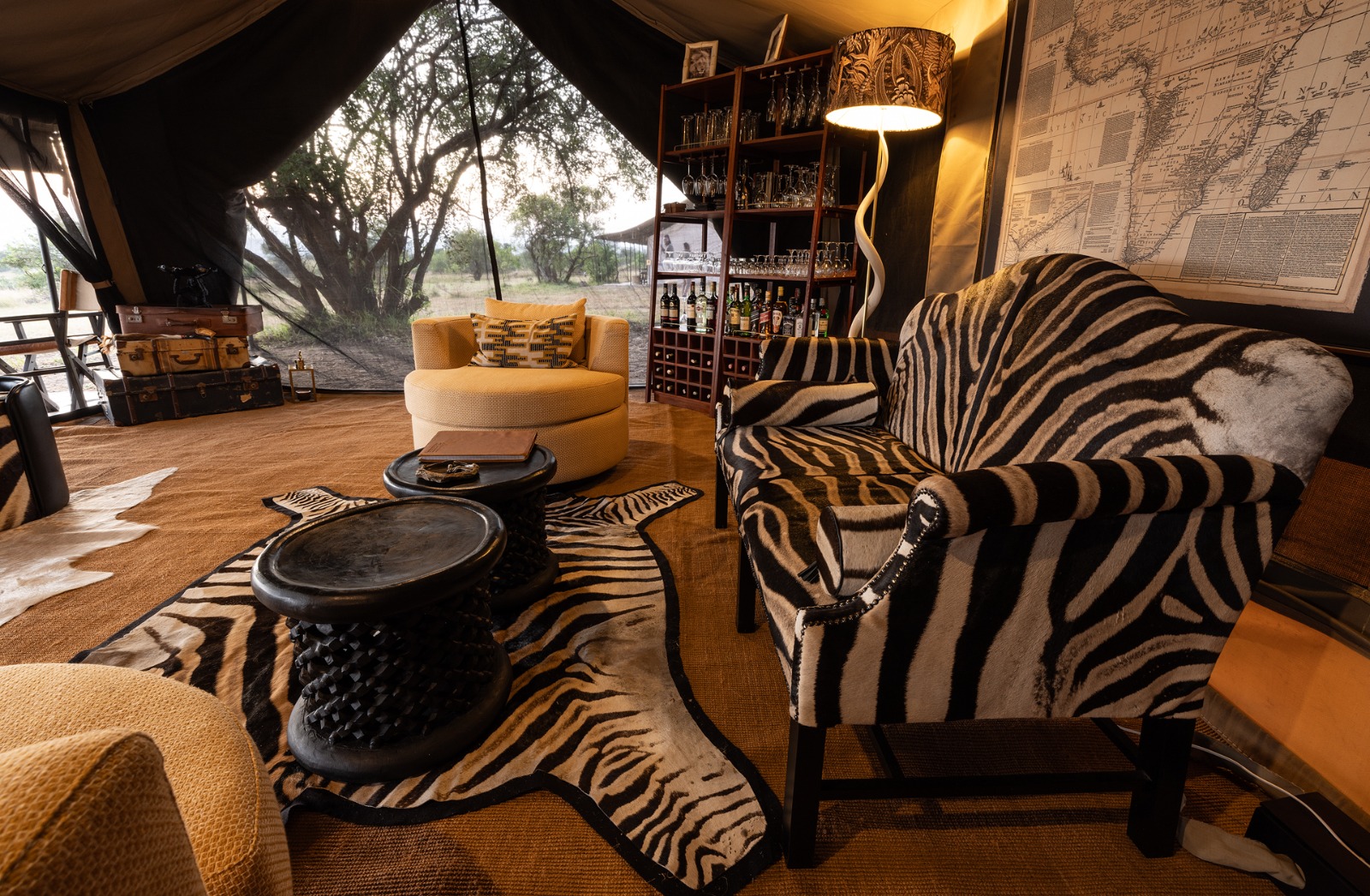 Kiboko Safaris guide beside the Land Cruiser